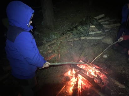 Cooking s'mores on the fire
