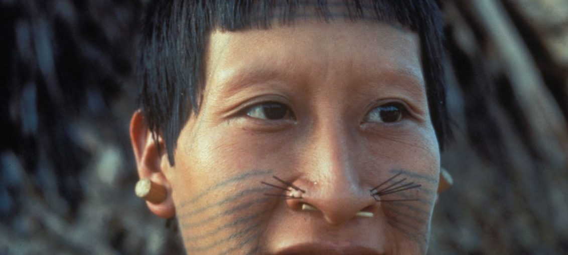 Tupá, a Matis woman, near the Itui river in the Javari Valley, Brazil.