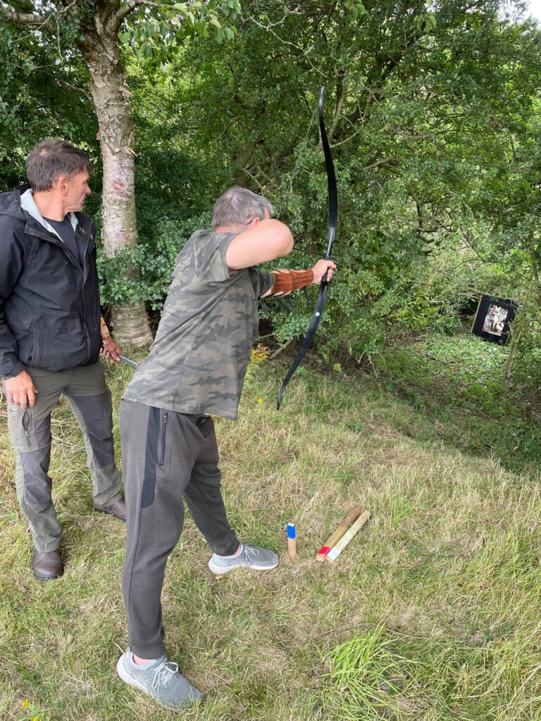 Aiming at a 2D target on the field archery range